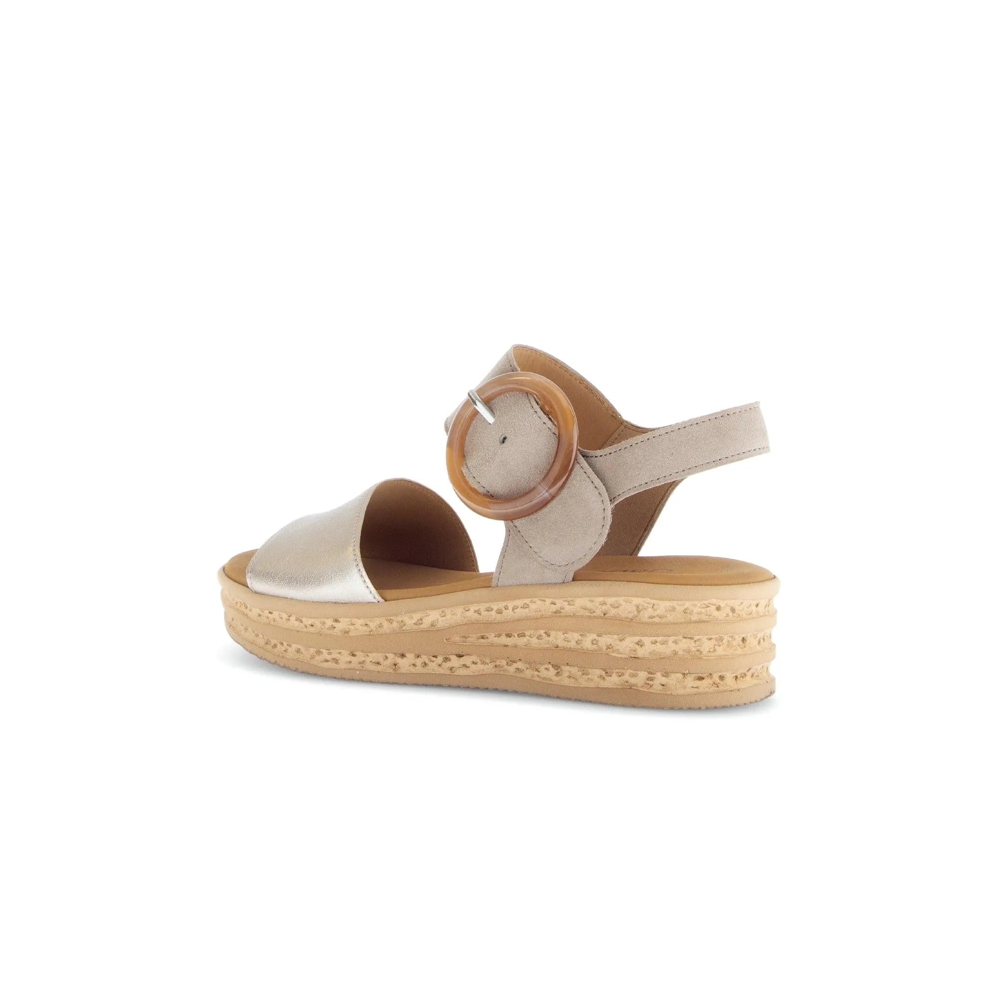 Beige leather touch fastening sandal with metallic front strap, buckled ankle strap, and textured wedge sole.
