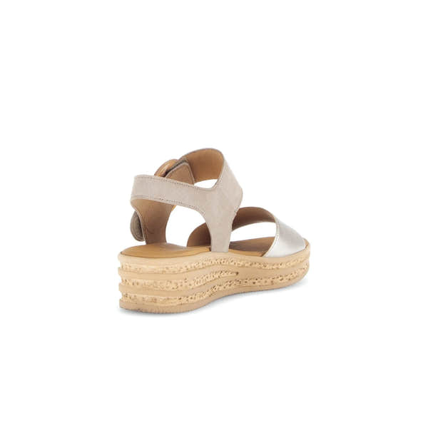 Beige leather touch fastening platform sandals with chunky textured sole and open toes for ladies.