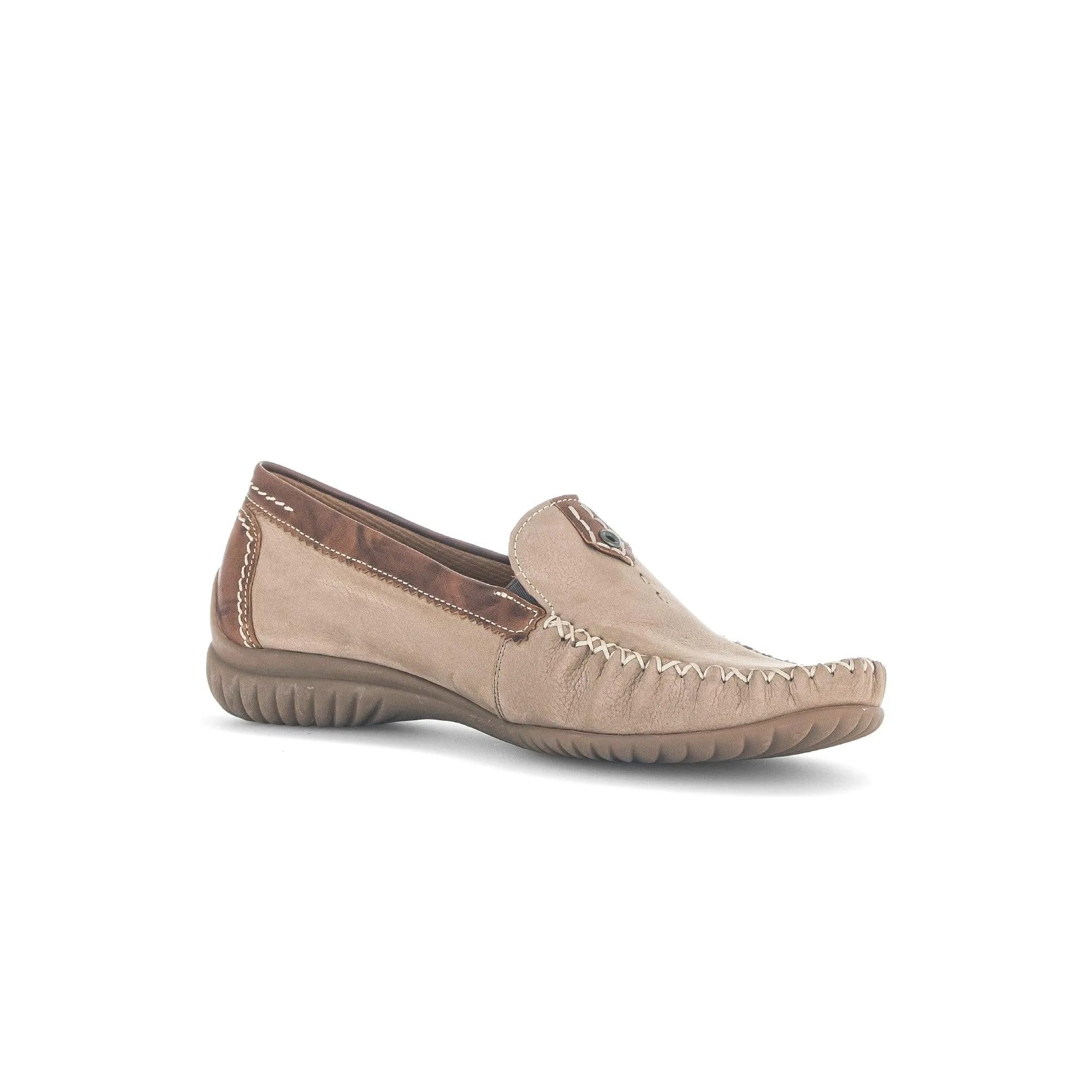 Beige nubuck slip-on shoes with contrasting brown leather, decorative stitching, and a flexible rubber sole.
