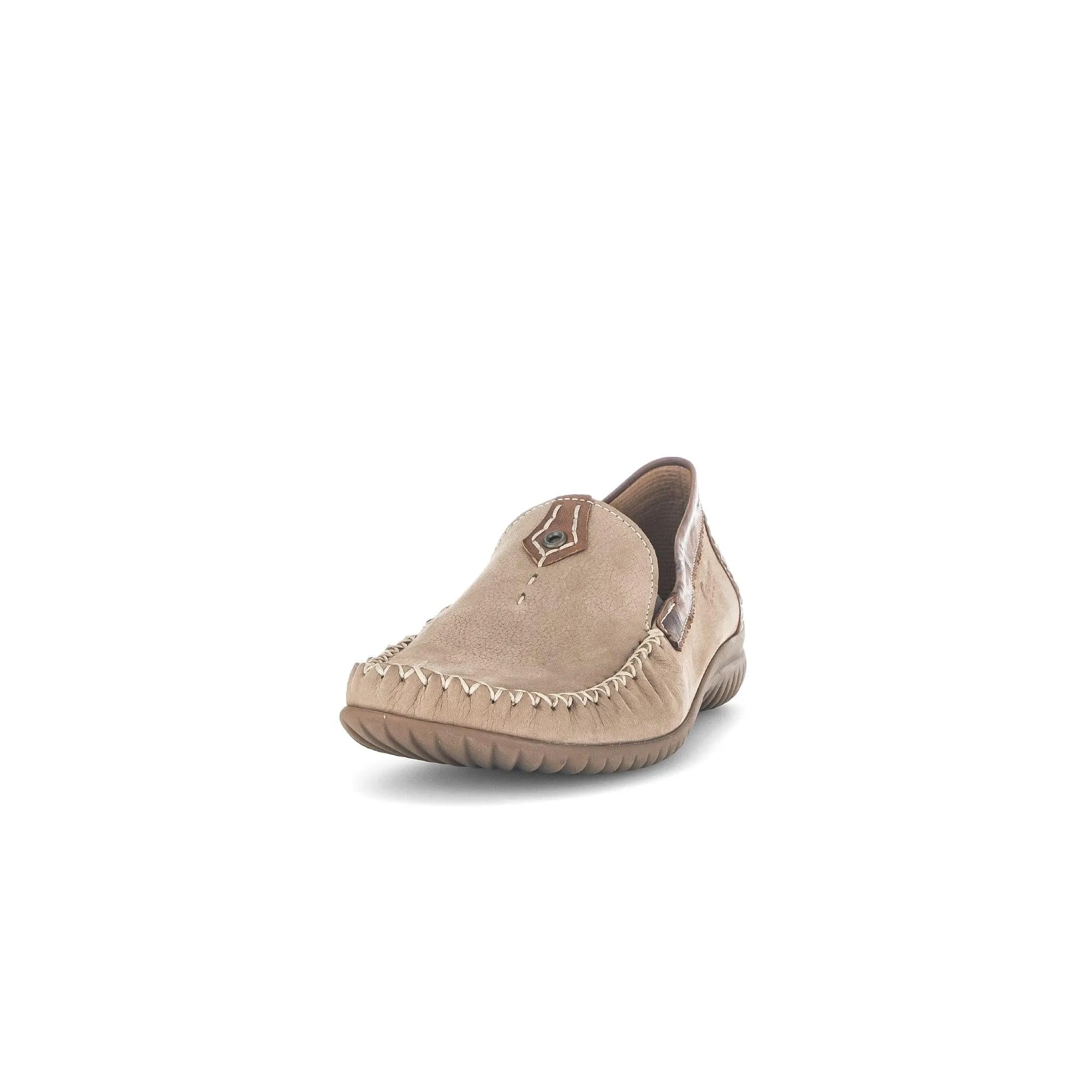 Beige nubuck slip-on shoes with decorative stitching and a brown leather accent. Stylish and casual design for ladies.
