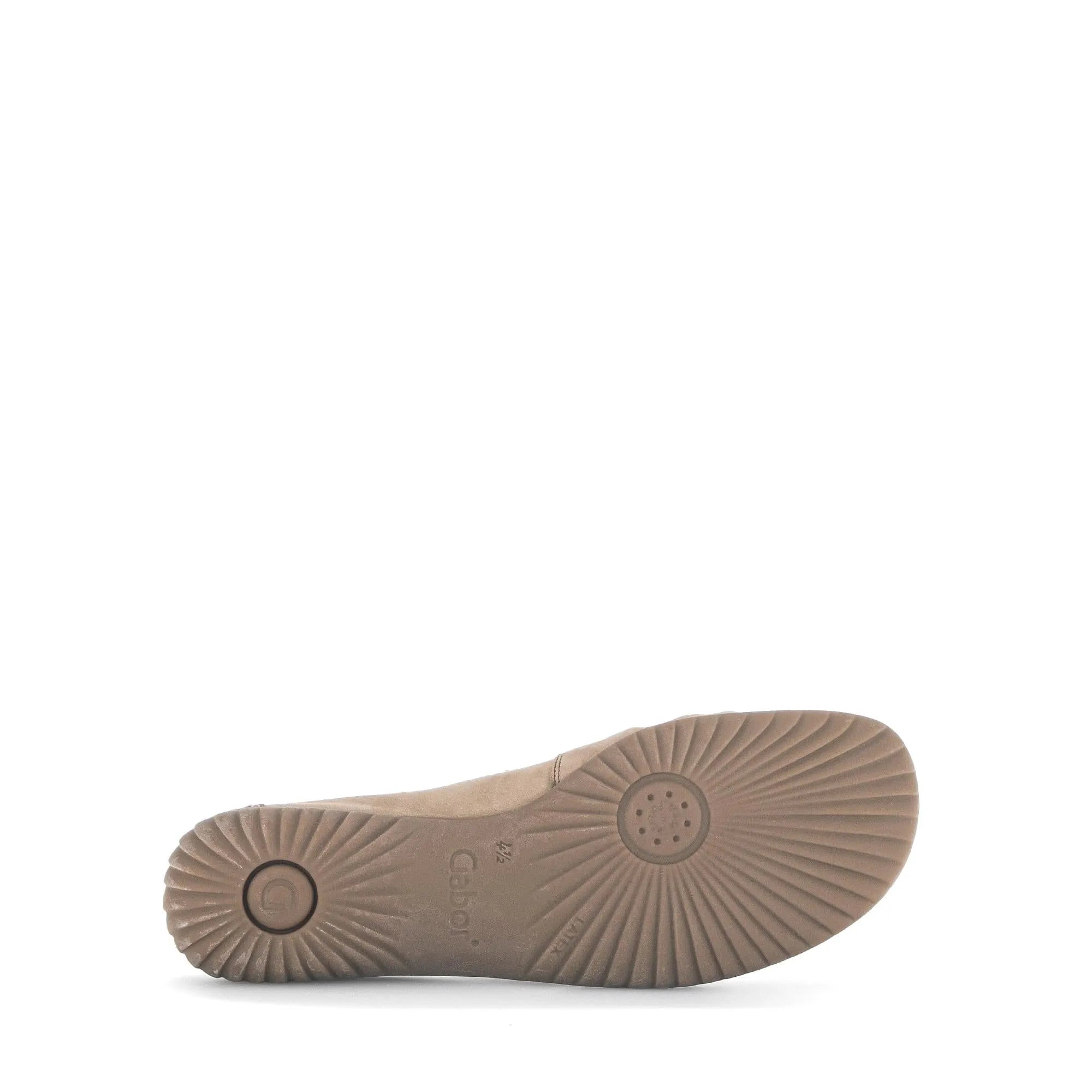 Beige nubuck slip-on shoes with a rubber sole, rounded toe, and minimal stitching for a sleek, casual style.