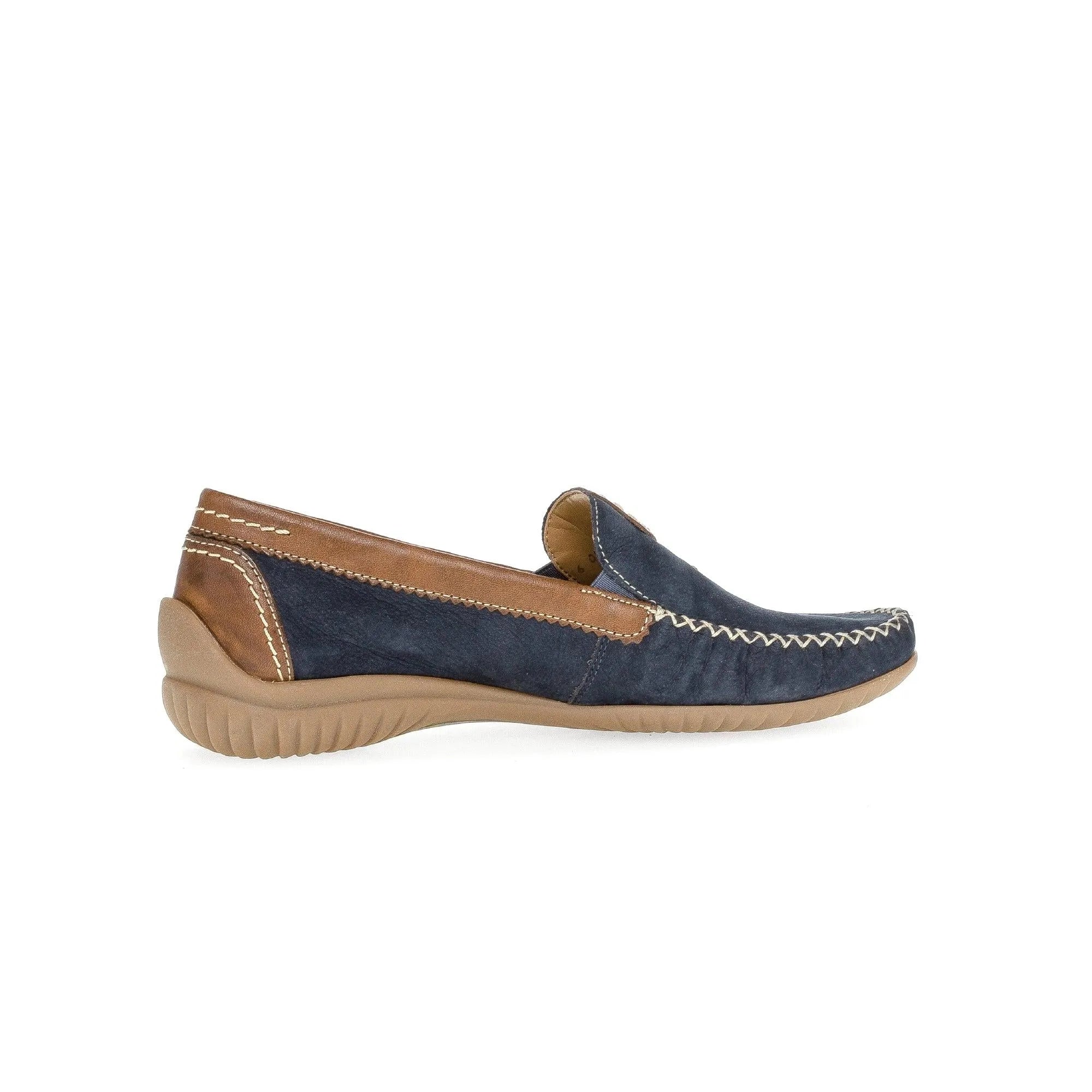 Blue nubuck slip-on shoe with tan leather accents and beige rubber sole, casual style, stitching details.