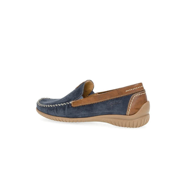 Blue nubuck slip-on shoes with brown leather accents, beige stitching, and a textured rubber sole.
