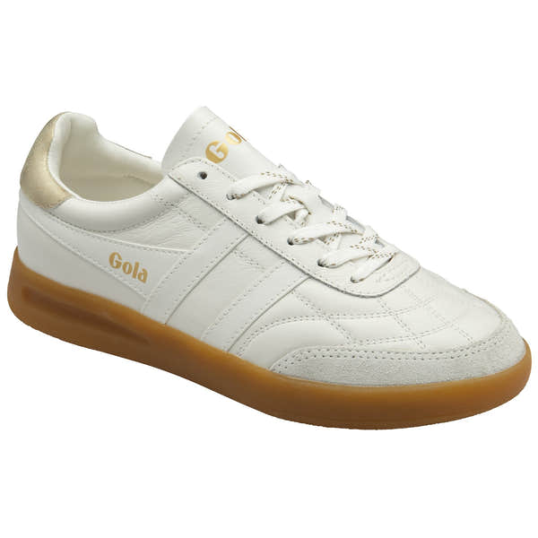 White leather women's lace-up trainers with gold accents and gum sole, Gola Stadia style.