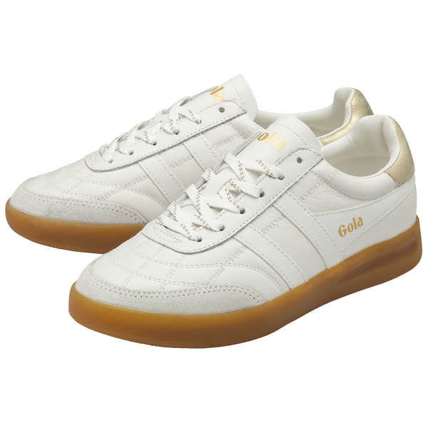 White and gold leather lace-up trainers with gum rubber sole, featuring "Gola" branding and sporty design.