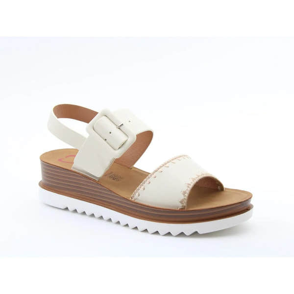 Heavenly Feet Anya ladies stone vegan buckle sandals with white straps, tan footbed, and ridged sole.