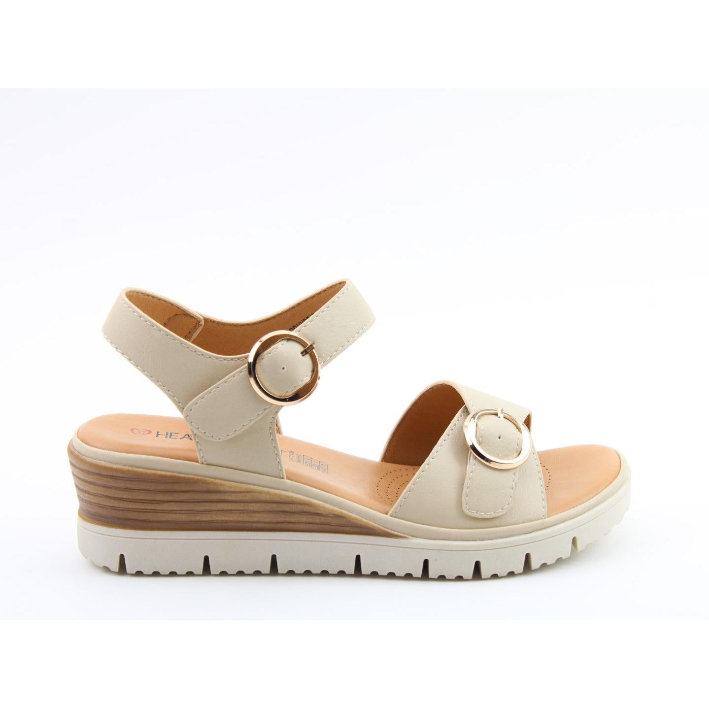 Heavenly Feet Concord Ladies beige vegan buckle sandals with adjustable straps and wedge sole.