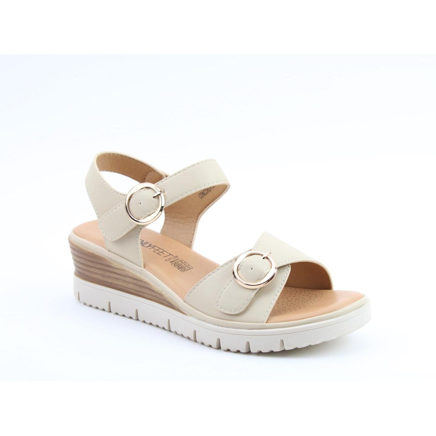 Heavenly Feet Concord women's beige vegan buckle sandals with cushioned footbed and wedge heel.