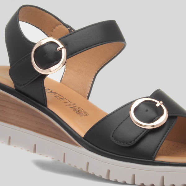Heavenly Feet Concord women's black vegan buckle sandals with cushioned insole and white outsole, stylish and comfortable.