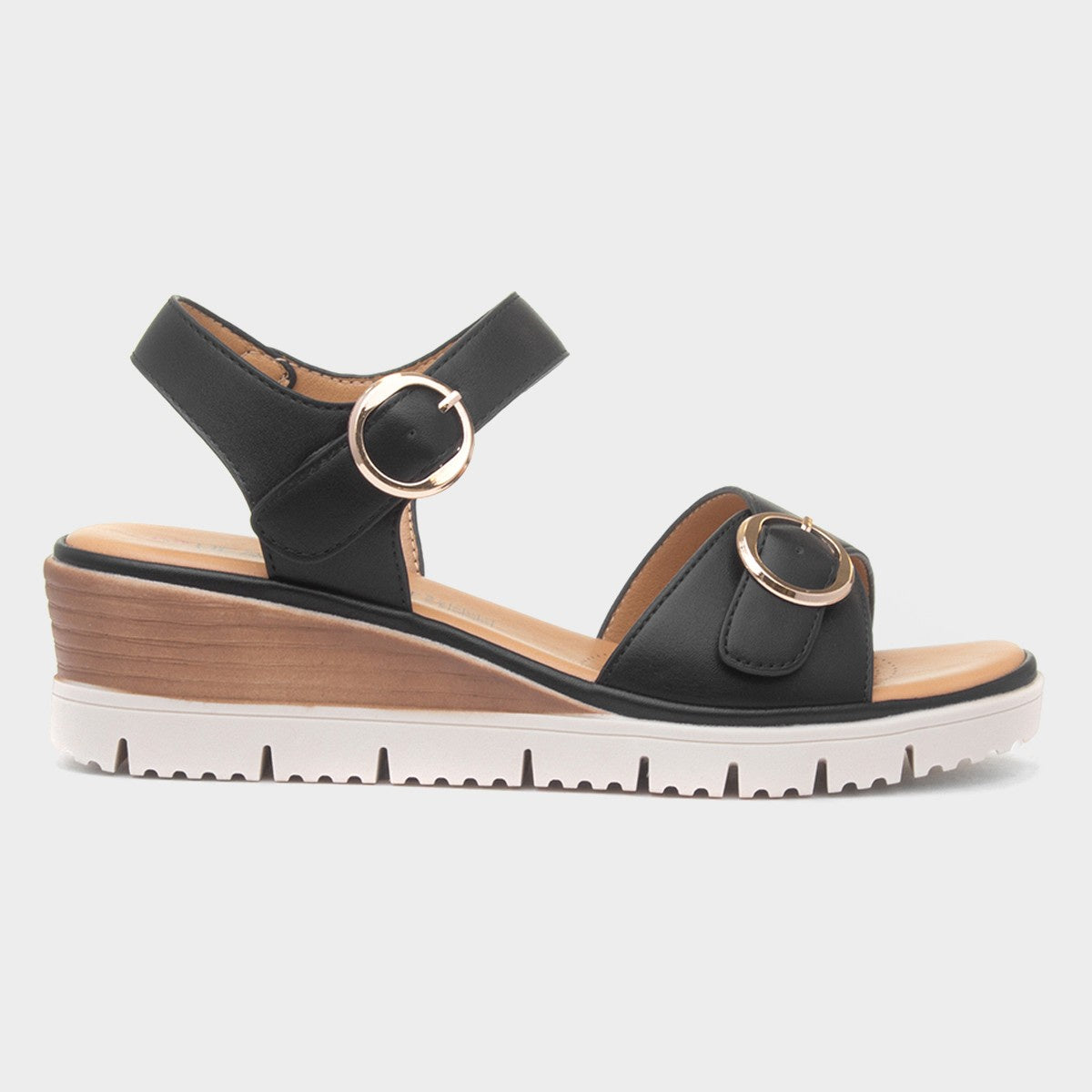 Heavenly Feet Concord Ladies black vegan buckle sandals with cushioned sole and wedge heel.