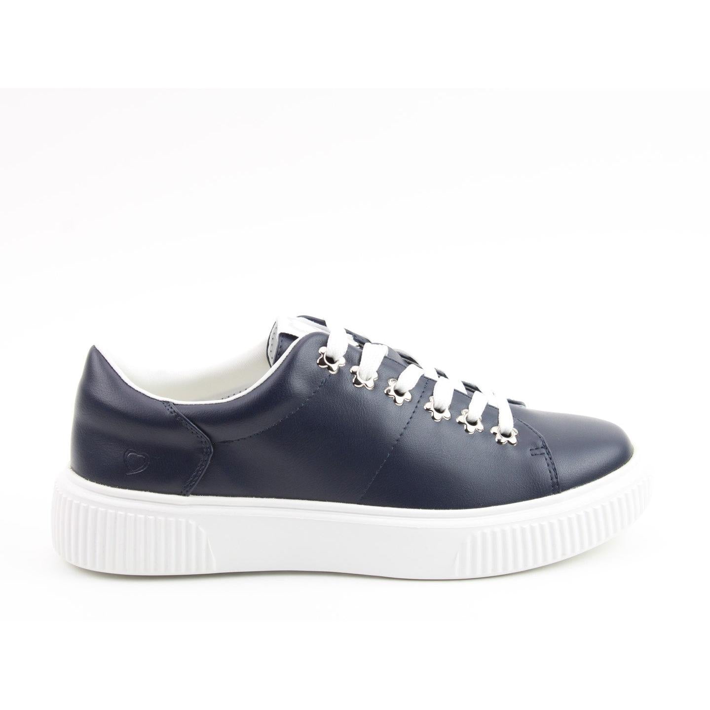 Heavenly Feet Feather Ladies Navy Vegan Slip-On Trainers with white rubber soles and lace-up design.