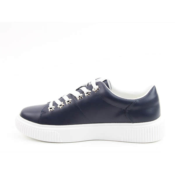 Heavenly Feet Feather Ladies Navy Vegan Slip-On Trainers with white soles and laces, stylish and eco-friendly footwear.