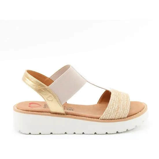 Heavenly Feet Mika women's beige, white, and gold vegan elasticated sandal with a cushioned white sole and open toe design.