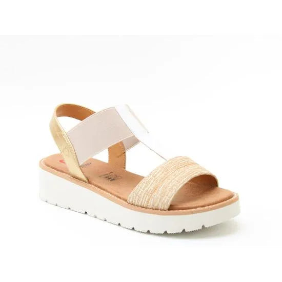 Heavenly Feet Mika Ladies beige, white, and gold vegan elasticated wedge sandals with cushioned footbed and thick white sole.