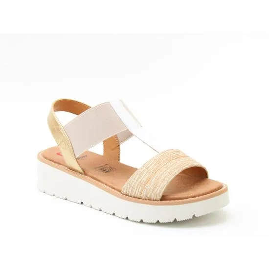 Heavenly Feet Mika Ladies beige, white, and gold vegan elasticated wedge sandals with cushioned footbed and thick white sole.