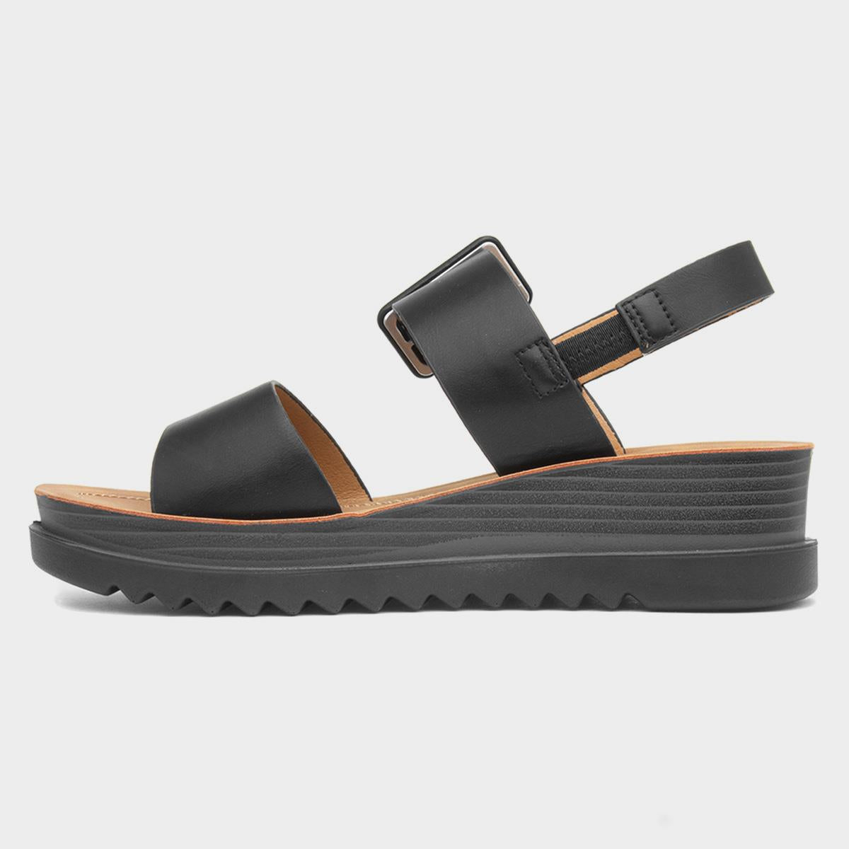 Heavenly Feet Pistachio women's black vegan buckle sandals with platform sole and adjustable ankle strap.