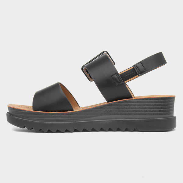 Heavenly Feet Pistachio women's black vegan buckle sandals with platform sole and adjustable ankle strap.