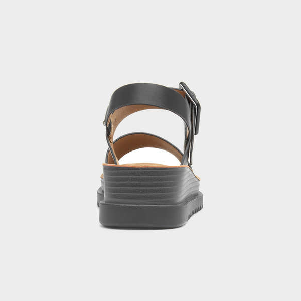 Heavenly Feet Pistachio Black Vegan Buckle Sandals with chunky platform sole and adjustable ankle strap.