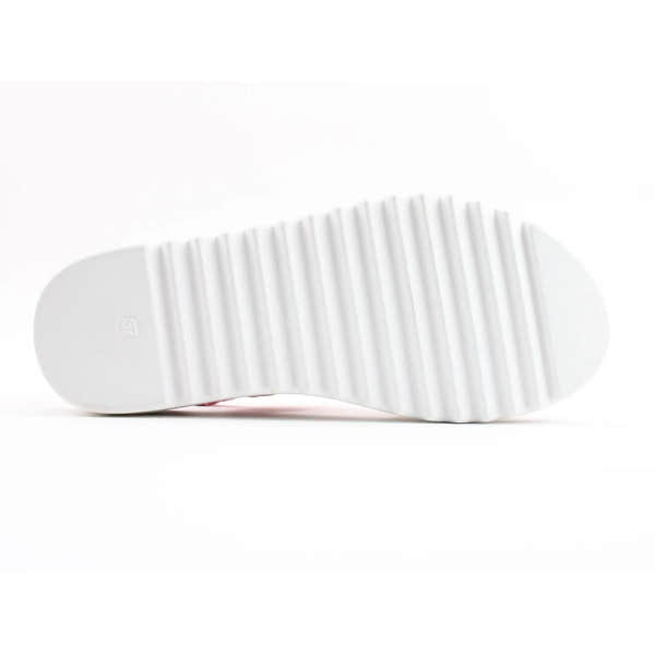 White sole of Heavenly Feet Pistachio Ladies Fuchsia and Orange Vegan Buckle Sandals, textured tread for grip.