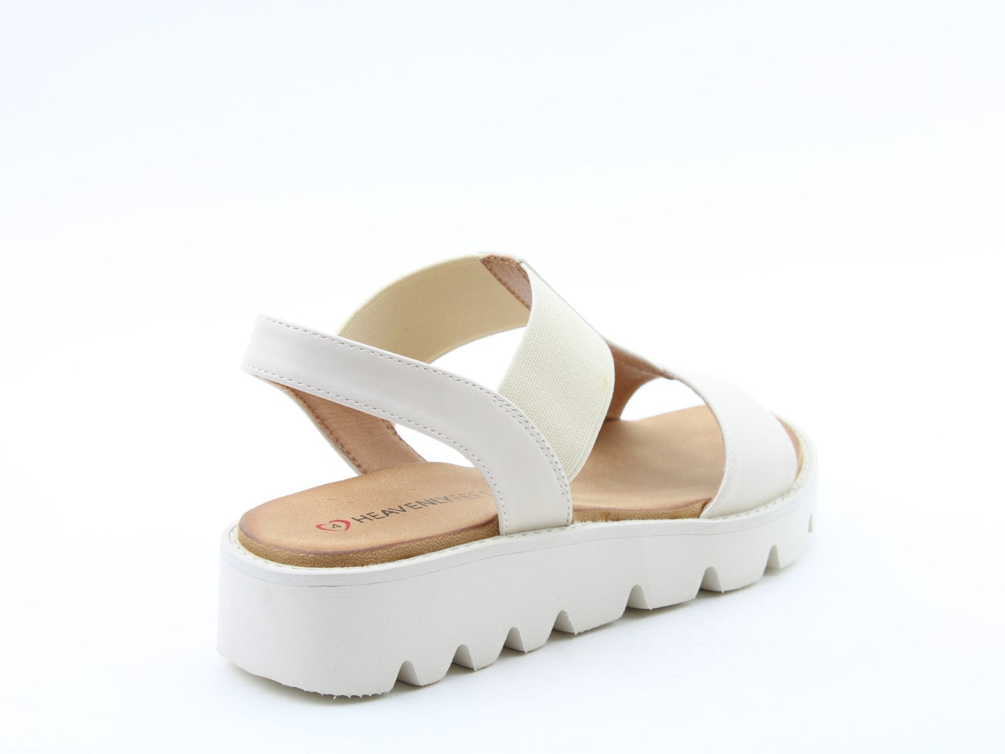 Heavenly Feet Ritz beige vegan pull-on sandals with a chunky white platform sole and elastic straps, stylish for summer wear.
