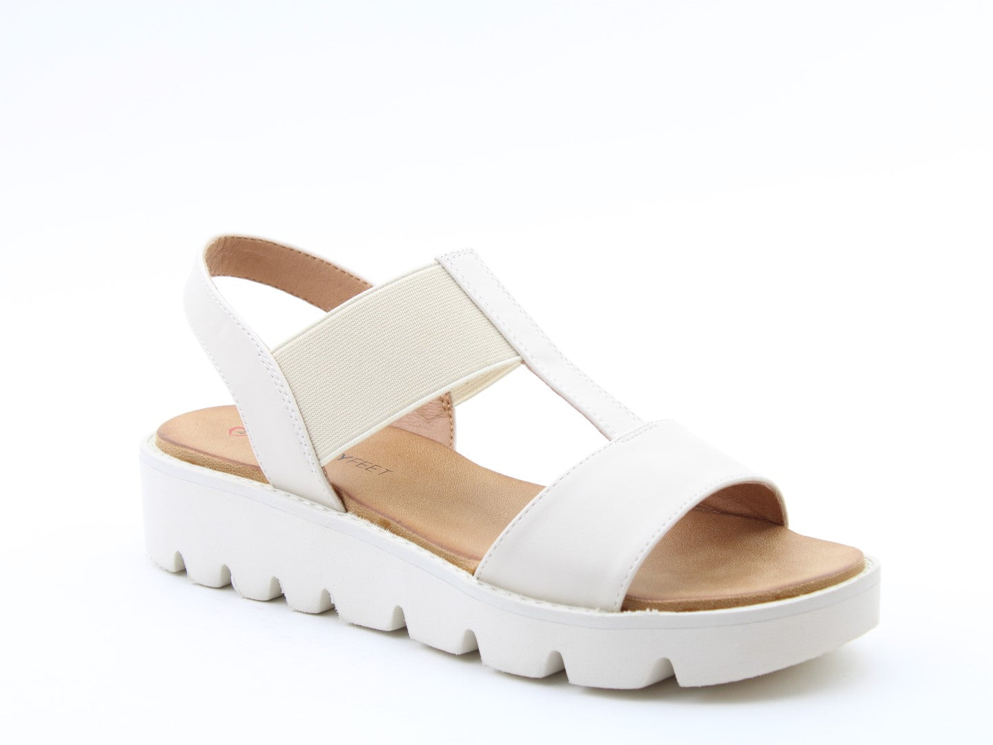 Heavenly Feet Ritz Ladies Beige Vegan Flat Sandals with elastic strap, pull-on style, and cushioned footbed.