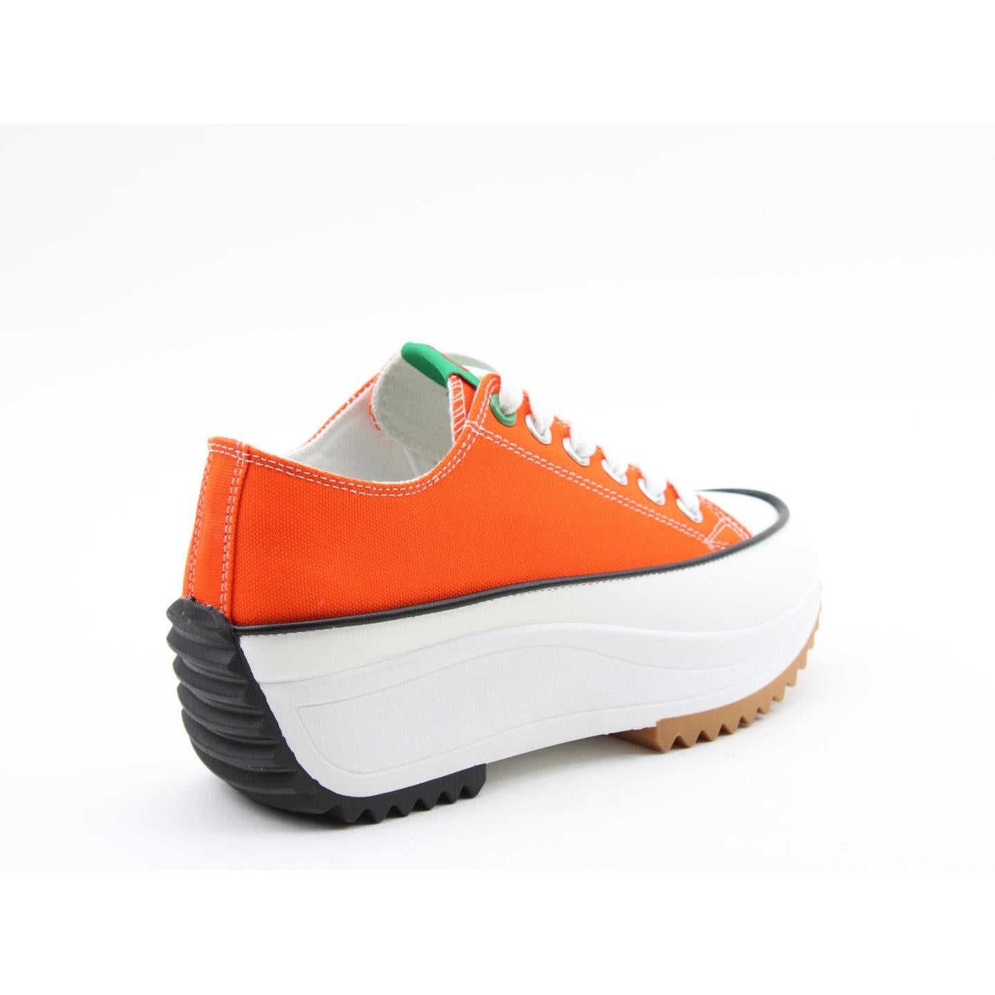 Heavenly Feet Strata Ladies orange textile vegan lace-up trainers with chunky white and black soles.
