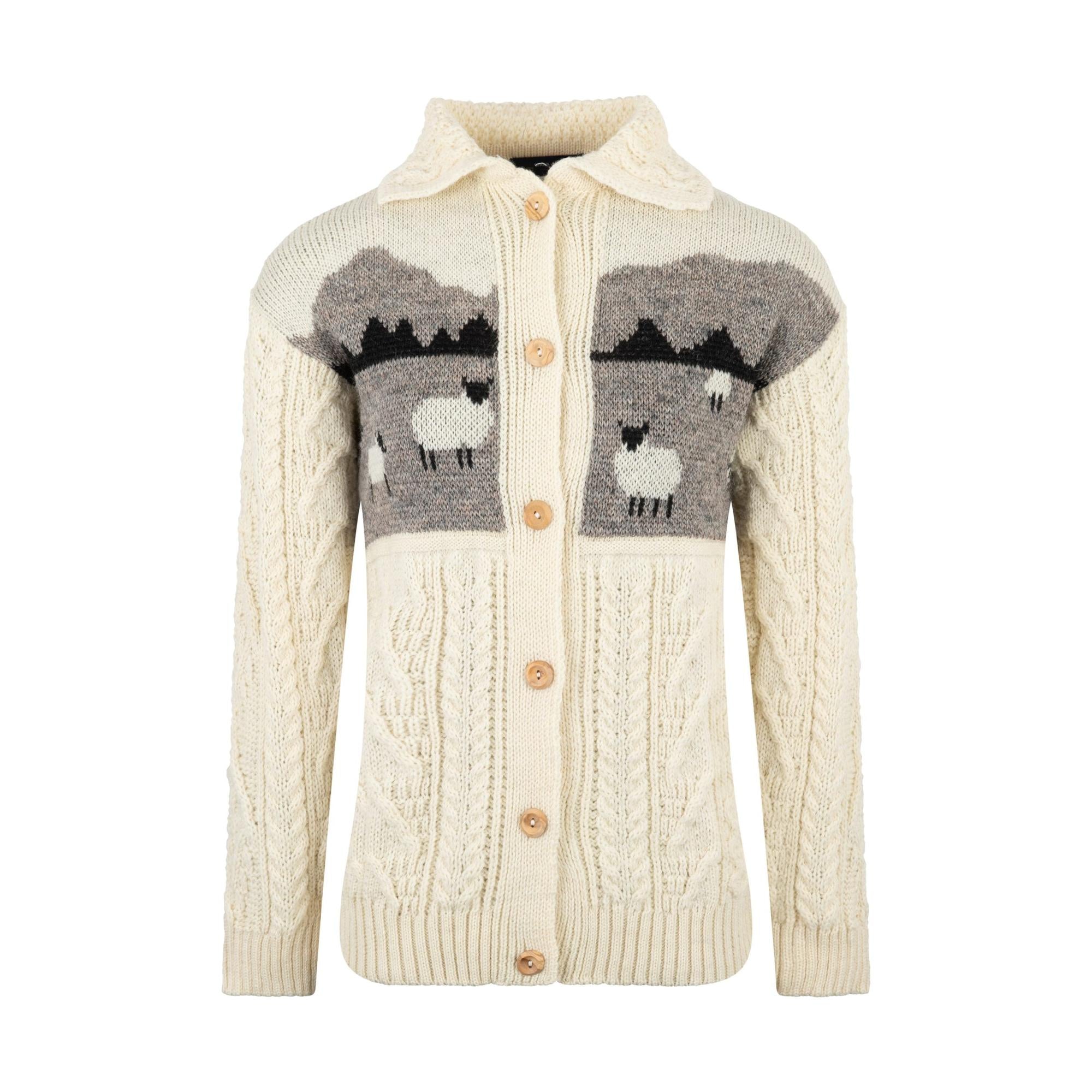 J M Cooper Ladies Aran Wool Sheep Scene Cardigan with cable knit accents and button closure.