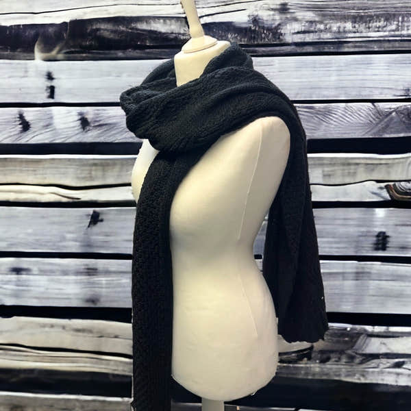 Jess & Lou chunky black cable knit scarf, cozy oversized winter accessory on mannequin, SW585.