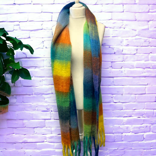 Jess & Lou colour block multi-check winter scarf, super soft, long with fringed ends, vibrant orange, green, blue, and yellow tones.