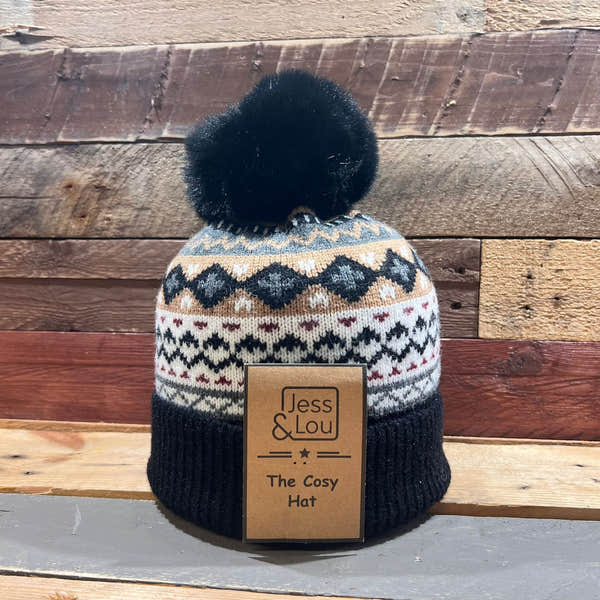 Unisex black Nordic cosy bobble hat with colorful fair isle pattern and faux fur pom-pom, ideal for winter warmth.
