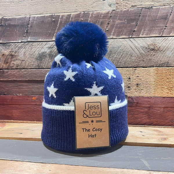 Unisex navy star cozy bobble hat with pom-pom, knit design, perfect for winter warmth and style.