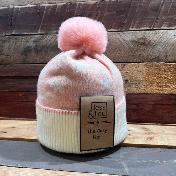 Pink unisex star-patterned bobble hat with pom-pom, ribbed cuff, and Jess & Lou branding.