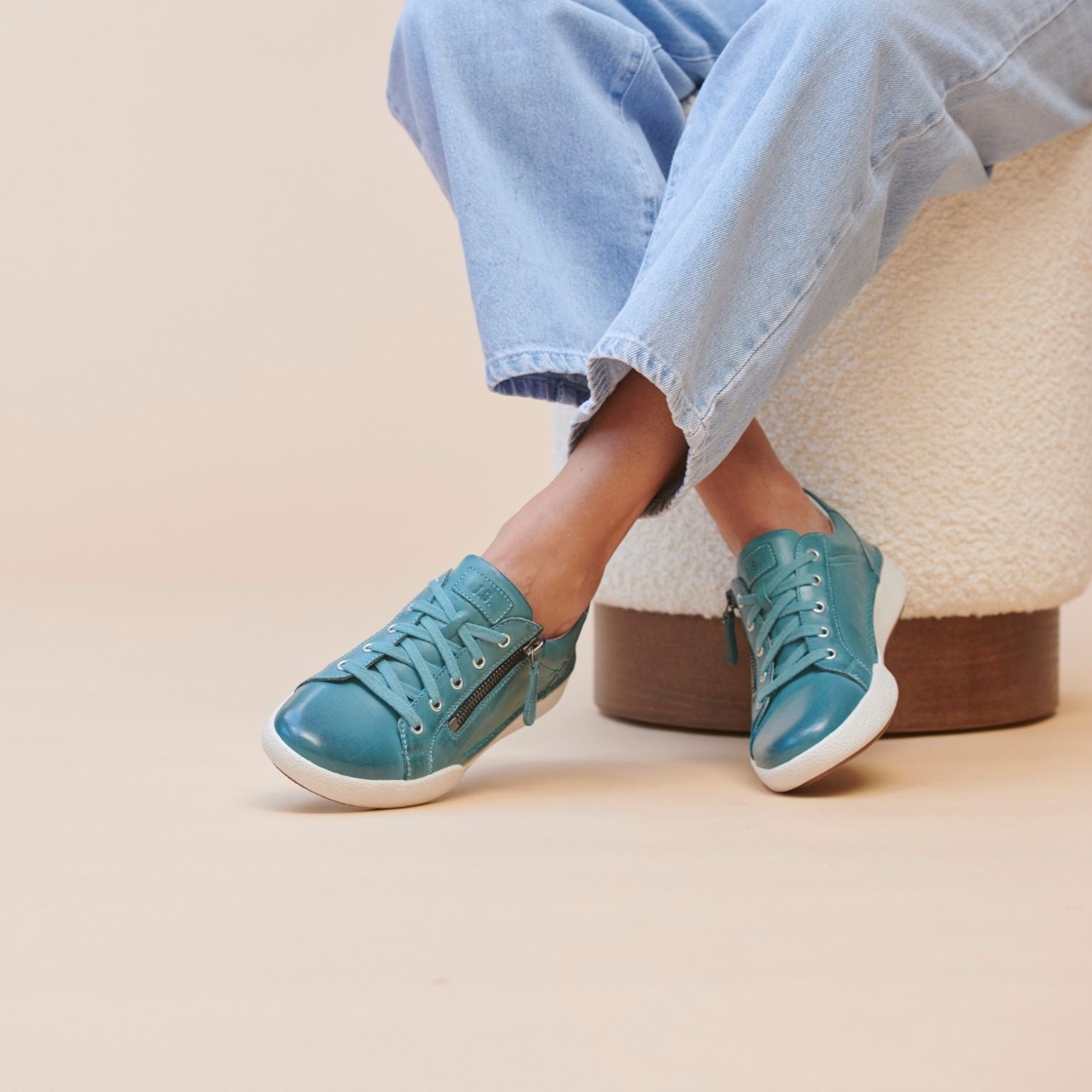 Josef Seibel Claire 03 women's azur blue leather trainers with zip and lace-up design, featuring arch support and stylish casual appeal.