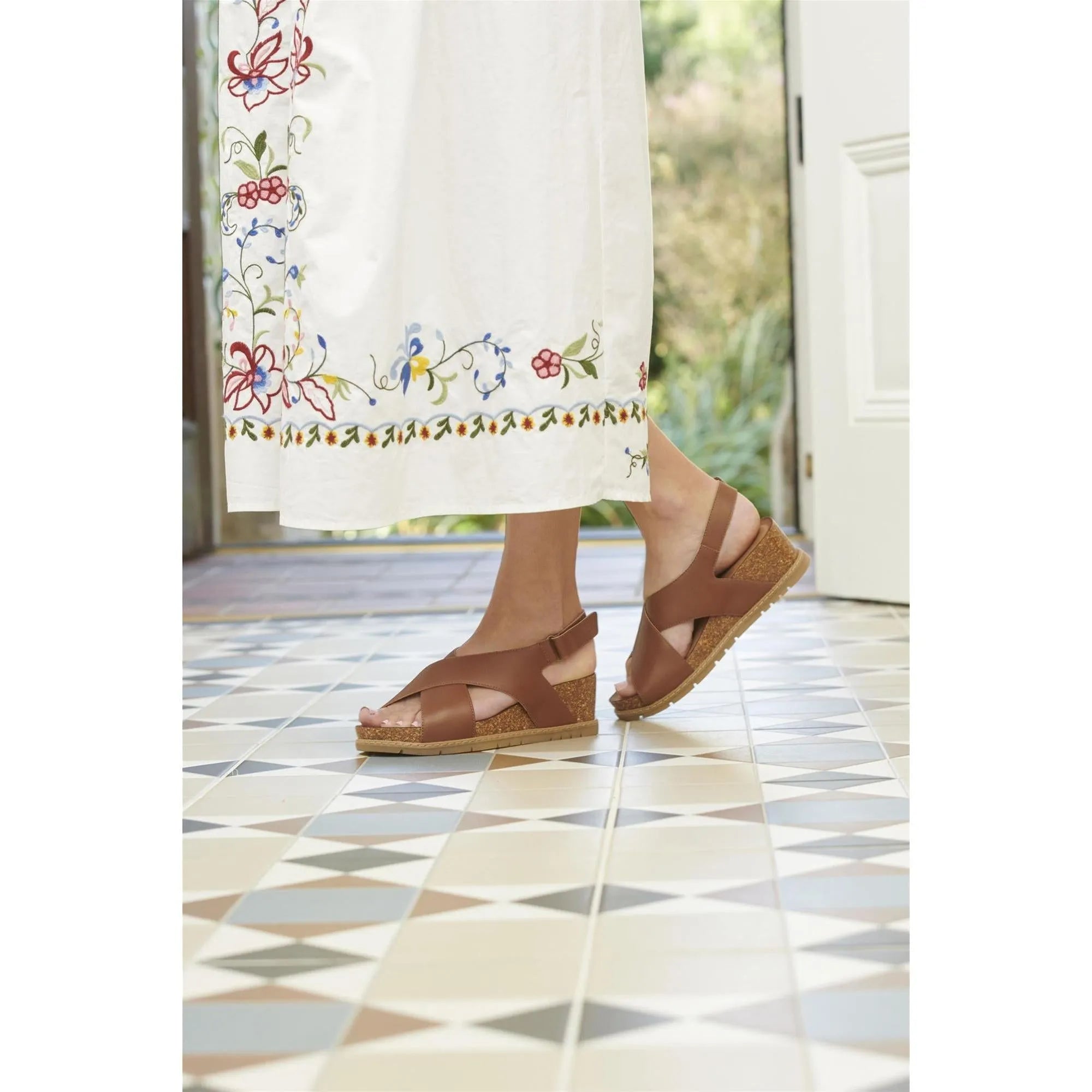 Josef Seibel Eden 01 ladies' dark brown leather touch fastening sandals, with cork wedge soles and open toes.