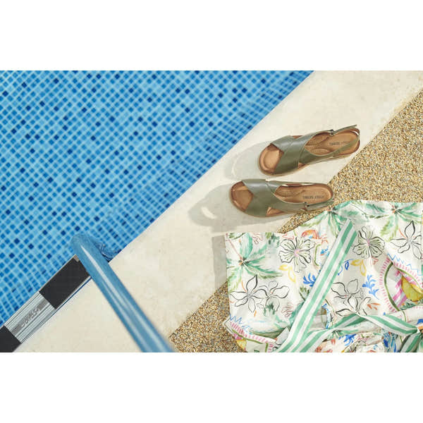 Olive leather Josef Seibel Eden 01 ladies' touch-fastening sandals next to a pool with a floral towel.