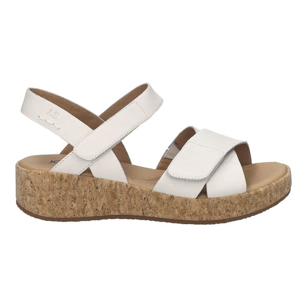White leather sandals with touch fastening straps and cork wedge sole, designed for comfort and casual style.