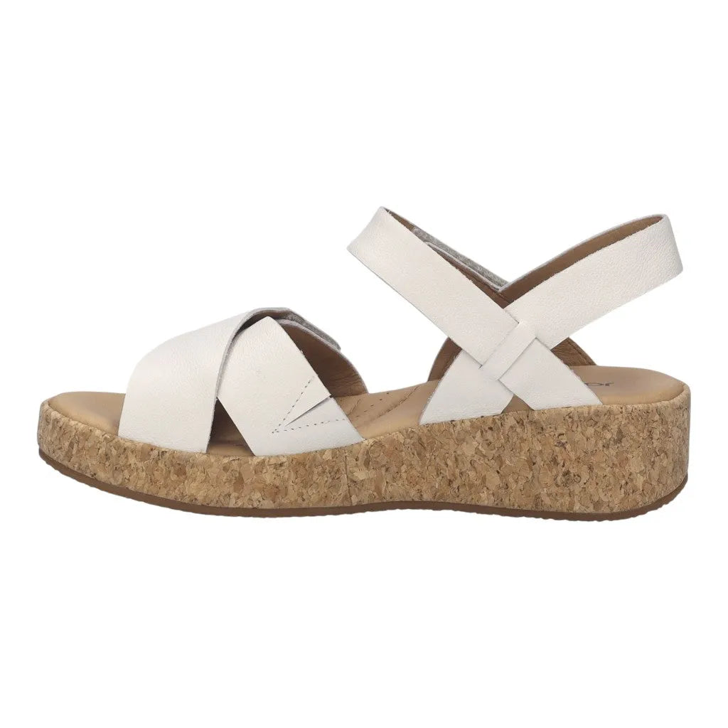 Josef Seibel Evita 03 women's white leather touch fasten sandals with a cork wedge sole and crisscross straps.