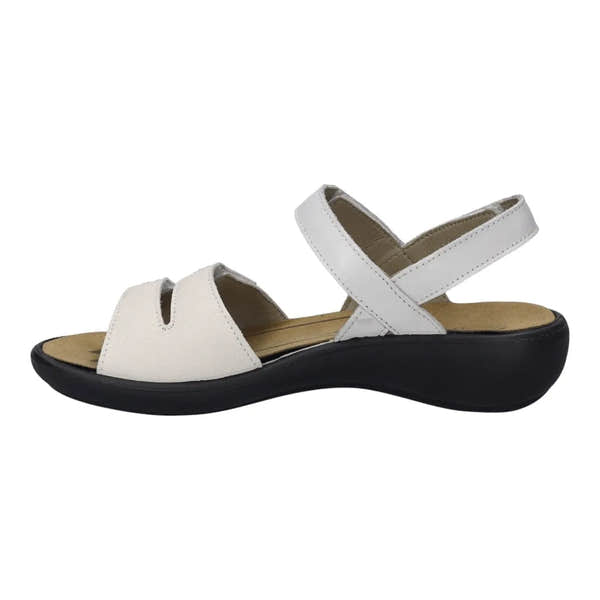 White leather touch fastening sandals with a cross strap design and cushioned insole, featuring a low black wedge heel.