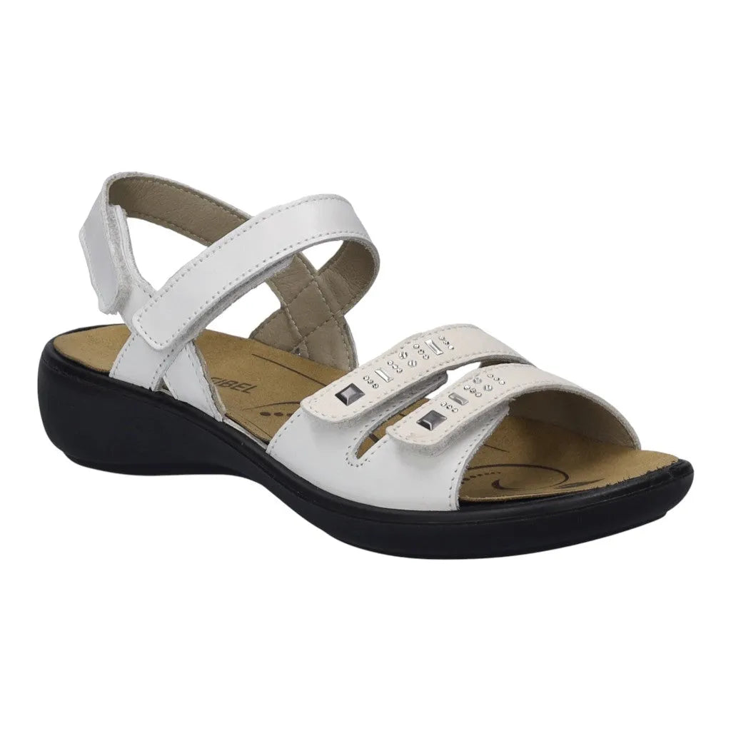 White leather touch fastening sandals with adjustable straps and a cushioned insole, featuring a low black wedge heel.