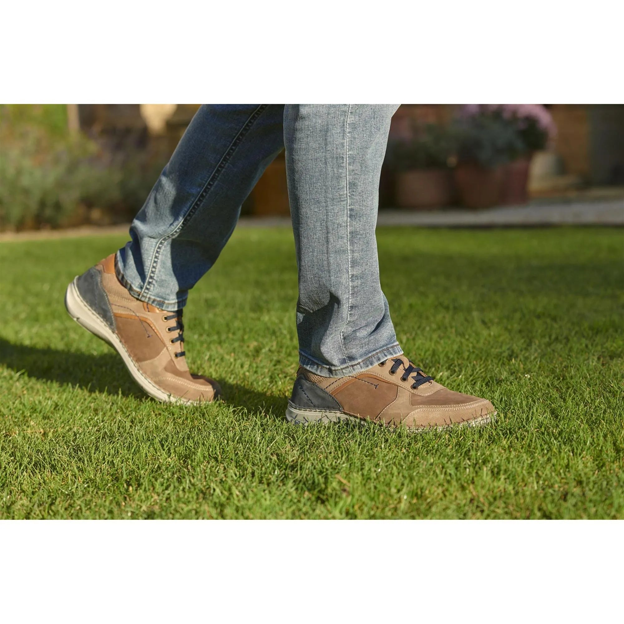 Josef Seibel New Anvers 10 men's wide multi-color leather lace-up shoes on grass, styled casual with grey jeans.