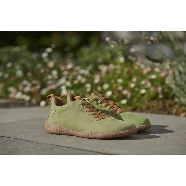 Josef Seibel Wynona 06 ladies' green leather lace-up shoes with brown laces and cushioned soles, shown outdoors on a concrete surface.