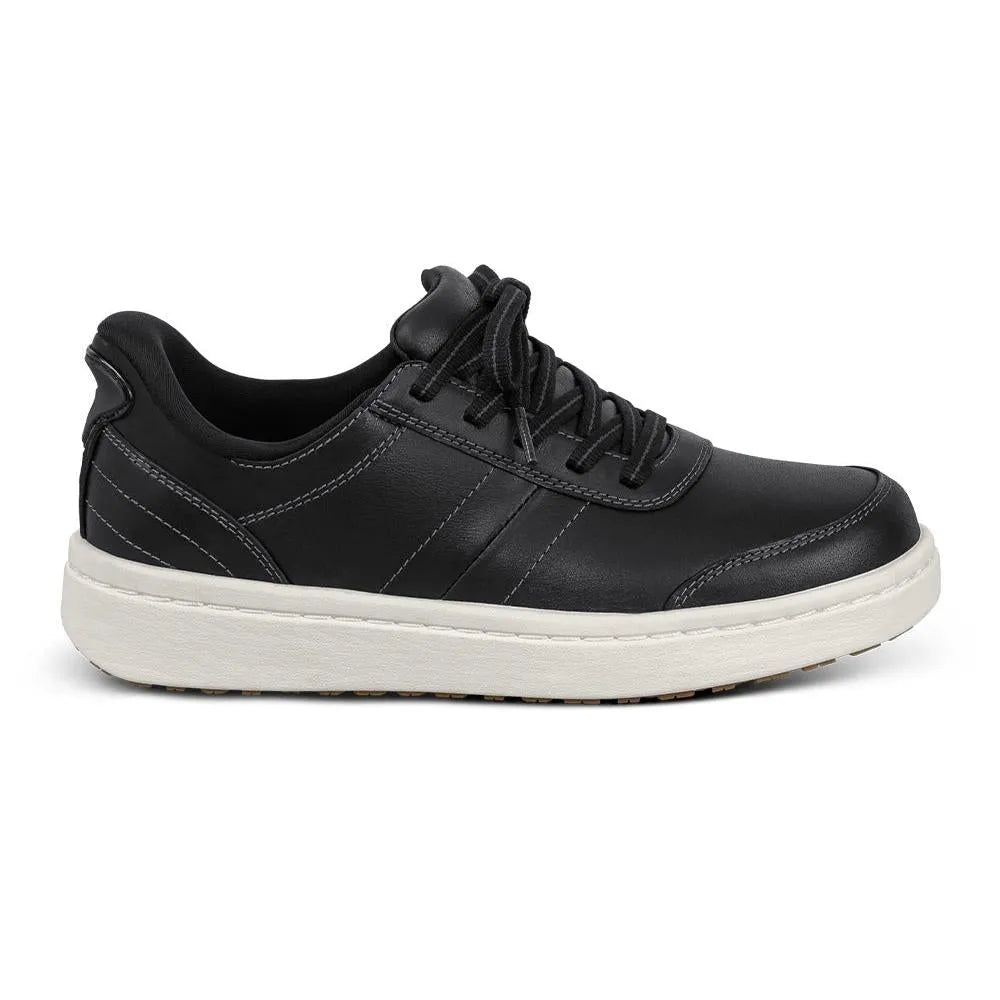Black leather lace-up trainers with white sole, arch support, and stitching details for women.