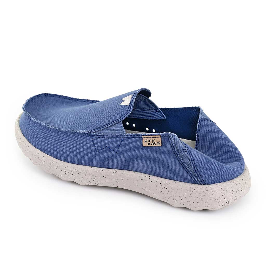 Kickback Couch 2.0 men's marine blue canvas slip-on loafers with arch support and textured white sole.