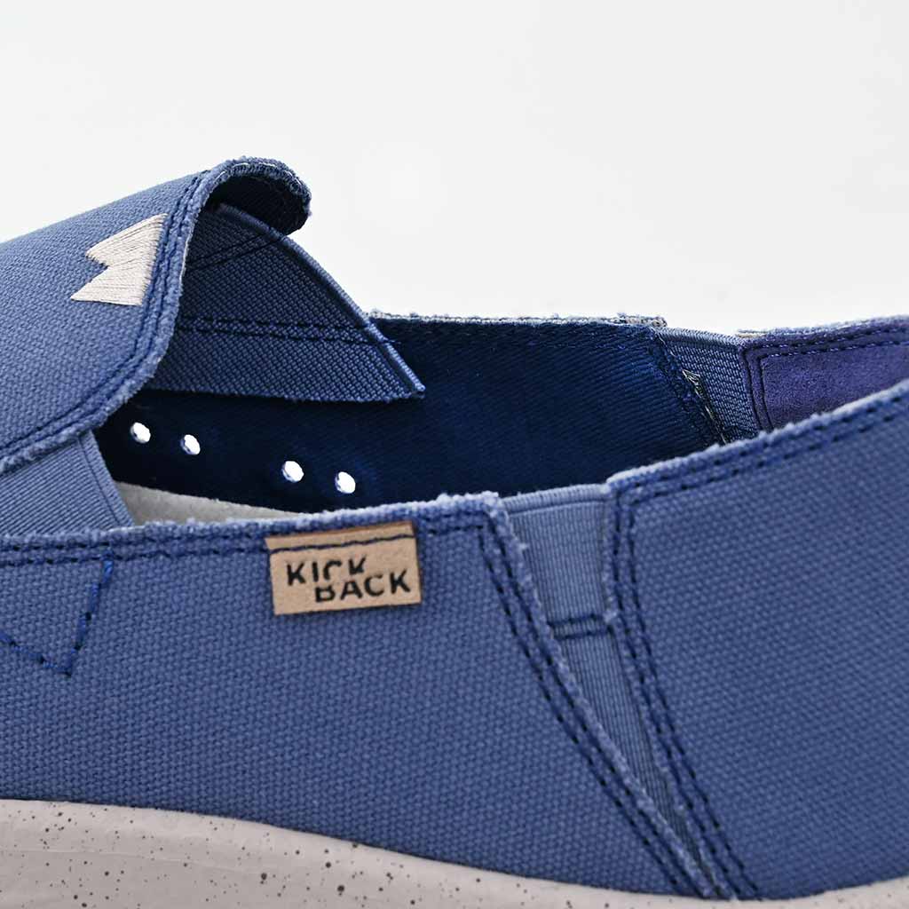 Kickback Couch 2.0 men's wide marine blue canvas slip-on loafers with arch support and textile upper.