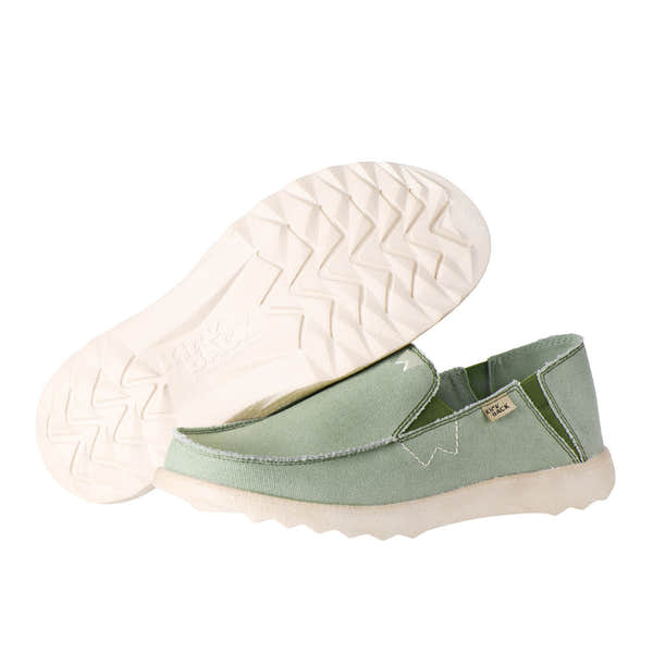 Kickback Couch 2.0 men's wide-fit green canvas slip-on loafers with arch support and textured sole for casual comfort.