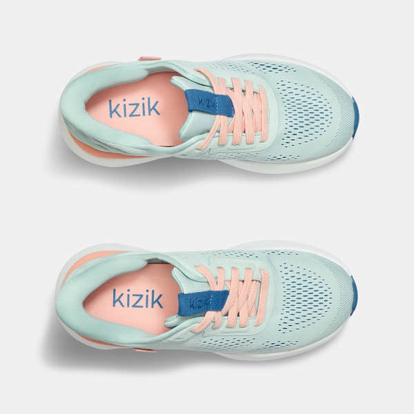 Kizik Athens 2.0 ladies slip-on trainers with peach parfait textile, arch support, breathable design, and pastel colors.