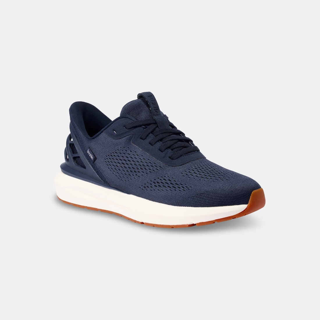 Kizik Athens 2.0 men's navy leather slip-on trainers with arch support, breathable mesh upper, and cushioned white and orange rubber sole.