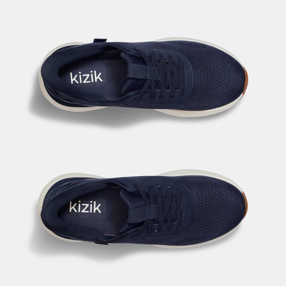 Kizik Athens 2.0 men's navy leather slip-on trainers with arch support and breathable knit upper, lightweight and comfortable casual shoes.