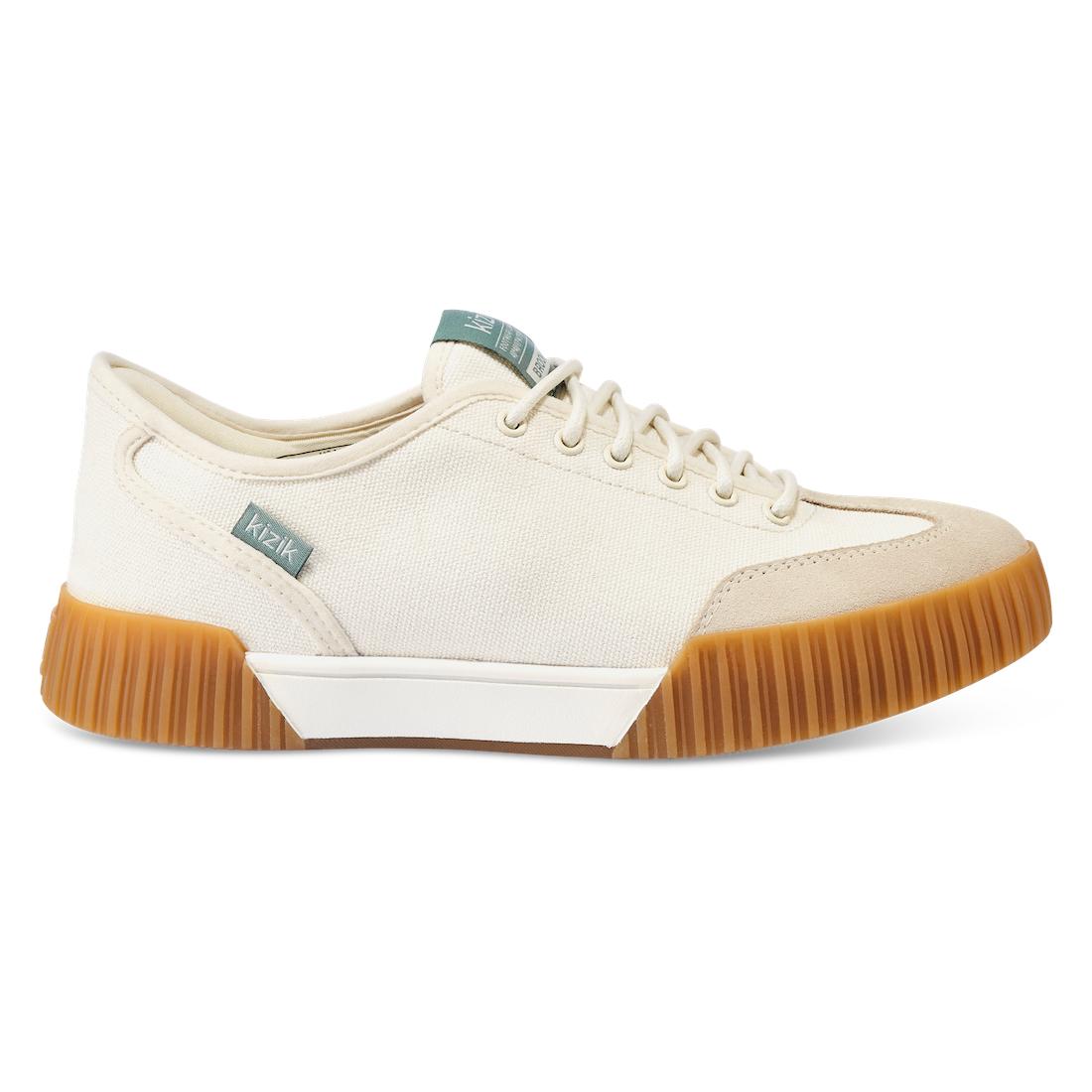 Kizik Brooklyn women's slip-on trainers with leather and textile upper, arch support, and chunky gum sole.