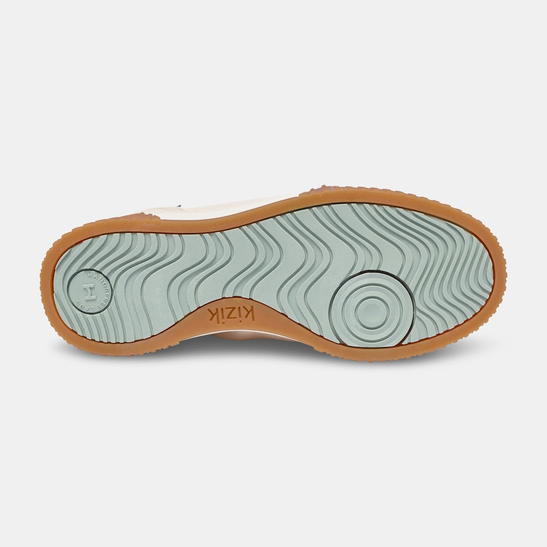 Kizik Brooklyn Ladies slip-on trainers with leather and textile upper, arch support, and rubber sole, designed for comfort and style.